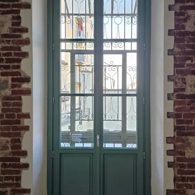 sostituzione portafinestra in legno centinati con inglesine